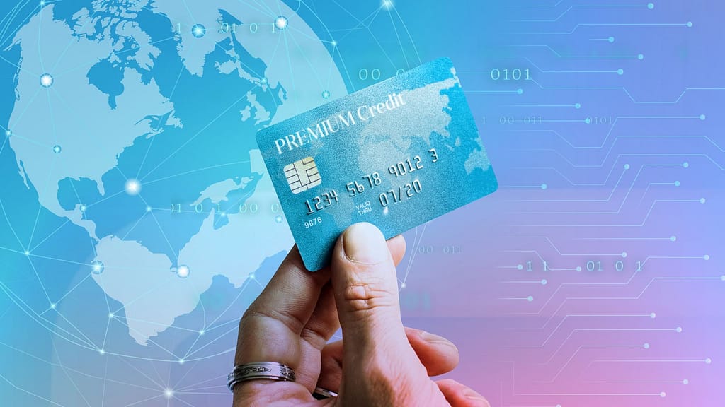 Woman holding a premium credit card Crea tu LLC desde España Optimizacion fiscal 2026